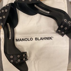 Classic Manolo Blahnik sandals with grommets
